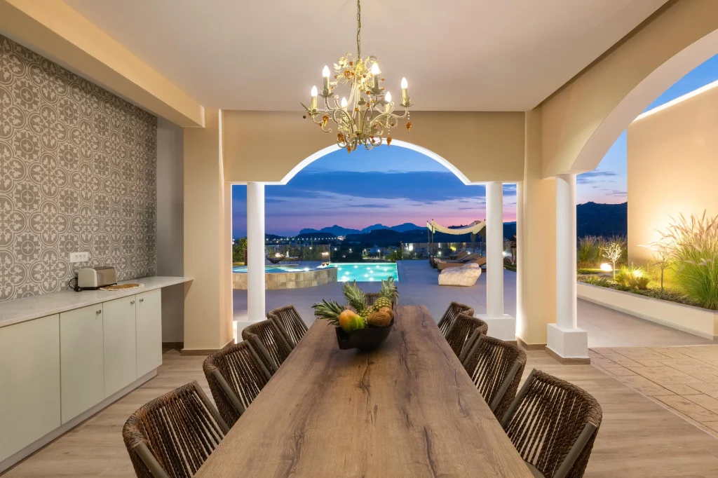 Stunning outdoor night view of Ralu Villa, beautifully illuminated under the night sky.